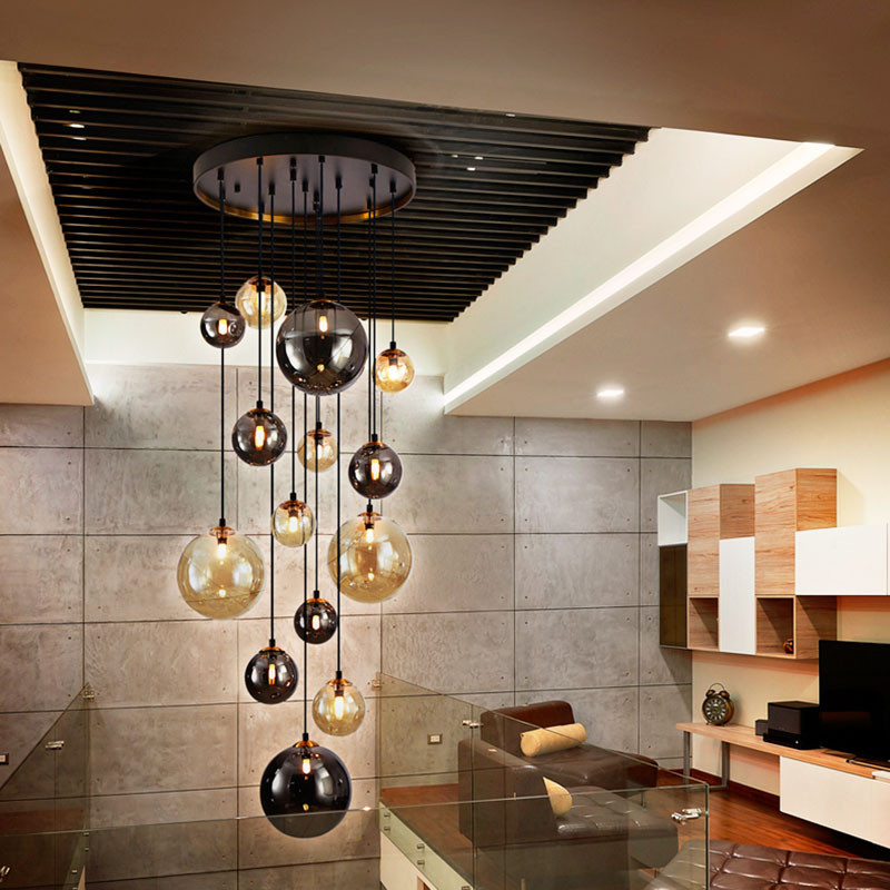 Suspension cascade 14 lampes DARK noir et laiton Schuller